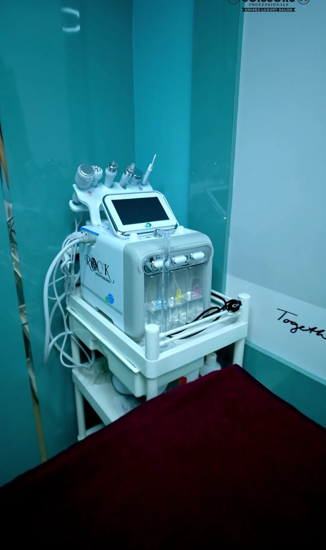 Hydra facial machine on a trolley in the treatment room